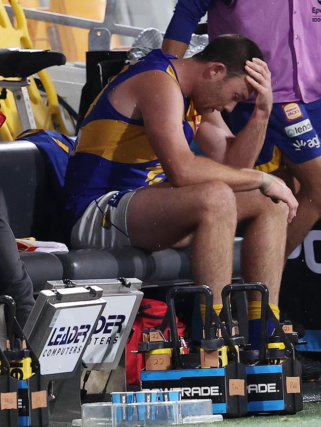 He cut a forlorn figure on the bench as he missed the rest of the match. Picture: Michael Klein