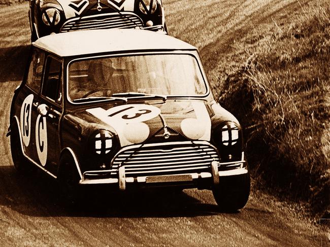 Racing car driver Bob Holden drives his Morris Mini Cooper to victory in the 1966 Hardie-Ferodo 500 race at Mount Panorama, Bathurst.