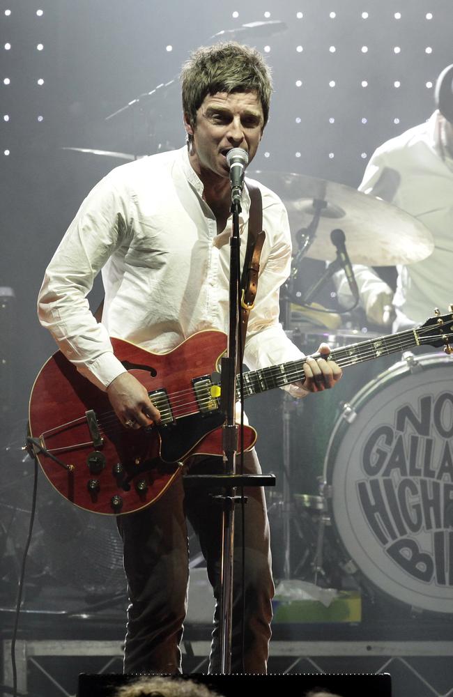 Frontman prop ... Gallagher will always have his trusty guitar in hand at the mic. Picture: Jake Nowakowski.
