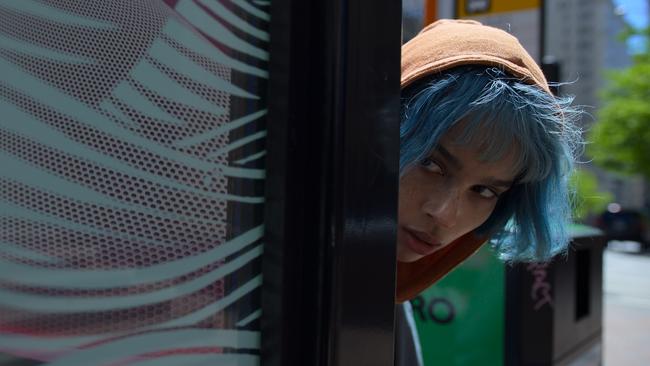 Zoe Kravitz, thin as a waif and with a blue-bob, commands every moment she is on screen