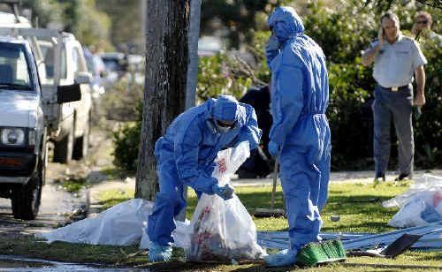 Specialist asbestos clean-up crews at work in Lennox Head, clearing away the hazardous material scattered by Thursday’s destructive tornado. Picture: Jay Cronan, Lismore Northern Star