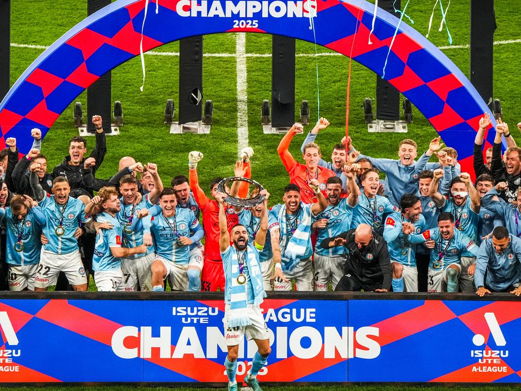 Aziz Behich lifts the trophy. Picture: Asanka Ratnayake/Getty Images