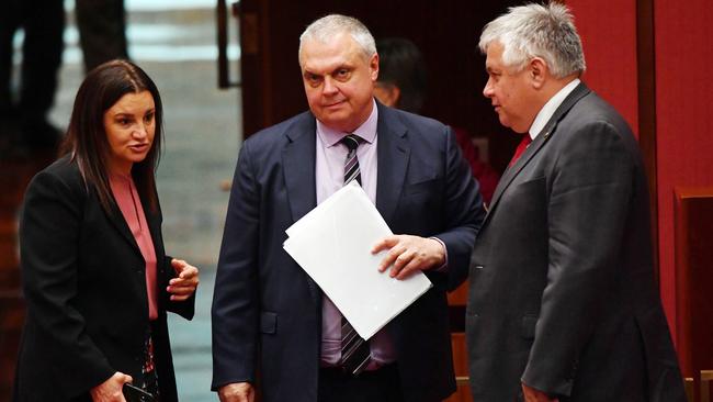 The fate of the proposed laws lie with senators Stirling Griff (centre) and Jacqui Lambie (left). SA Senator Rex Patrick (right) said he would support an inquiry into the bill.