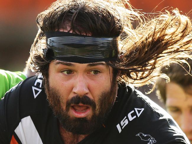 Tigers Aaron Woods is tackled during the Wests Tigers v Canberra Raiders rugby league game at Leichhardt Oval, Sydney. Pic Brett Costello