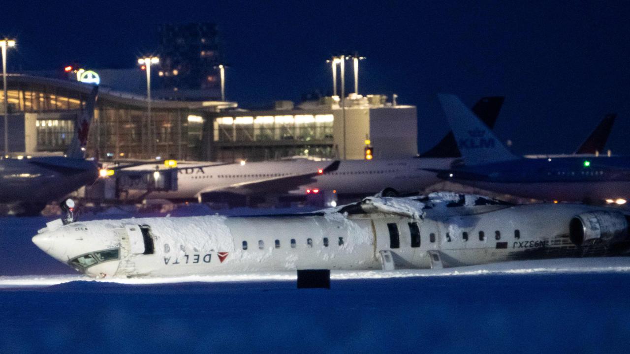 Delta Airlines plane that crashed and injured at least 18 passengers at Toronto Pearson International Airport this week. Picture: Katherine KY Cheng / GETTY IMAGES NORTH AMERICA / Getty Images via AFP.