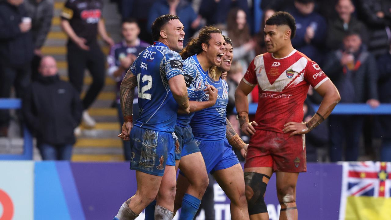 WARRINGTON, ENGLAND - NOVEMBER 06: Brian ToÃ¢â&#130;¬â&#132;¢o of Samoa celebrates their sides third try during the Rugby League World Cup Quarter Final match between Tonga and Samoa at The Halliwell Jones Stadium on November 06, 2022 in Warrington, England. (Photo by Alex Livesey/Getty Images for RLWC)