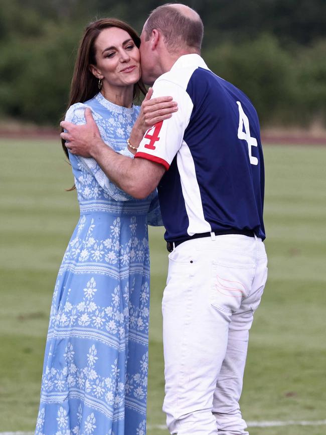 Princess of Wales and Prince of Wales embrace each other after attending The Royal Charity Polo Cup. Picture: AFP