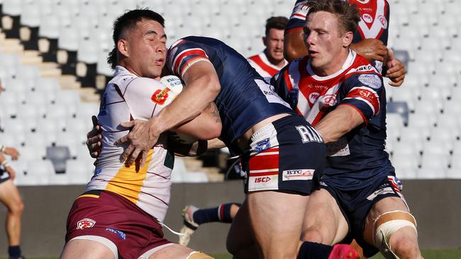 Thirlmere's Wiremu Tuiletufuga takes on Camden’s defence. Picture: John Appleyard