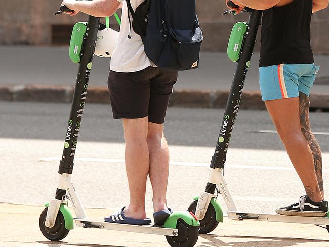 7/3/2019: Generic views of the Lime scooters being ridden and left waiting for customers around the CBD, Brisbane. Lyndon Mechielsen/The Australian