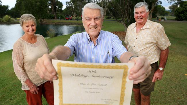 Minister Geoff Prentice with Allan and Lois Cottrell. Photo: Scott Powick