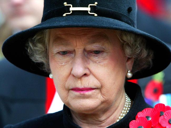 Britain's Queen Elizabeth II sheds a tear during the Field of Remembrance Service at /Westminster /Abbey Nov 07  2002 in /St /Margaret's /churchyard. (AP Pic/Jeremy Selwyn /Evening /Standard)  headshot sad tears royalty