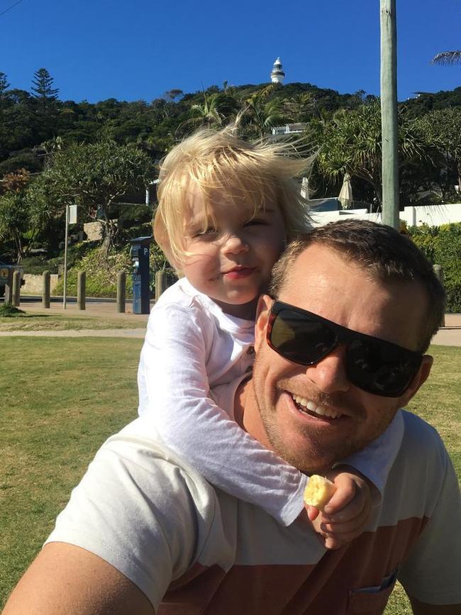 Arlo and his dad Rowan Ozols, who is in isolation at the hospital.