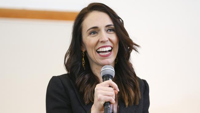 New Zealand’s leader Jacinda Ardern talks to COVID-19 community responders in Wellington ahead of the country’s election in September. Picture: Getty Images