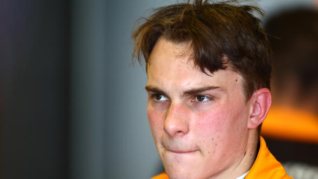 ABU DHABI, UNITED ARAB EMIRATES - NOVEMBER 22: Oscar Piastri of Australia and McLaren looks on in the garage during Formula 1 testing at Yas Marina Circuit on November 22, 2022 in Abu Dhabi, United Arab Emirates. (Photo by Mark Thompson/Getty Images)