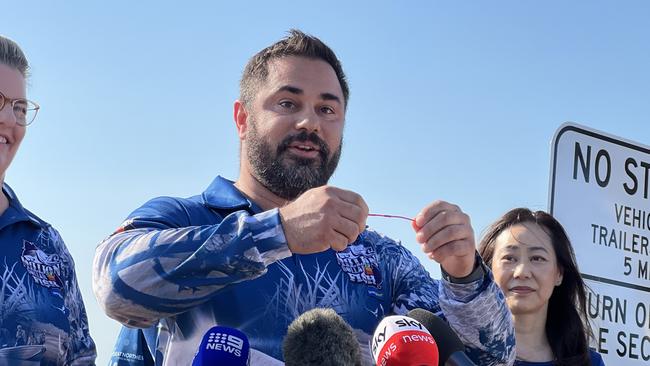 Sportsbet NT Operations and Partnerships Manager Thijs Bors shows off a red tag ahead of Season 10 of the Million Dollar Fish. Picture: Fia Walsh.