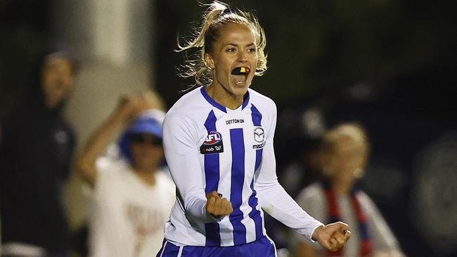 Kaitlyn Ashmore celebrates a goal while playing for North Melbourne. Photo by Daniel Pockett/Getty Images