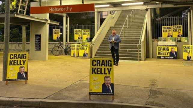 The former MP posed on social media in front of posters in his electorate ahead of the election.