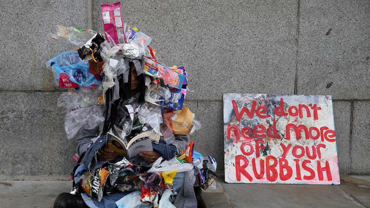 An activist covered in plastic packaging in London on Monday. Picture: Isabel Infantes/AFP