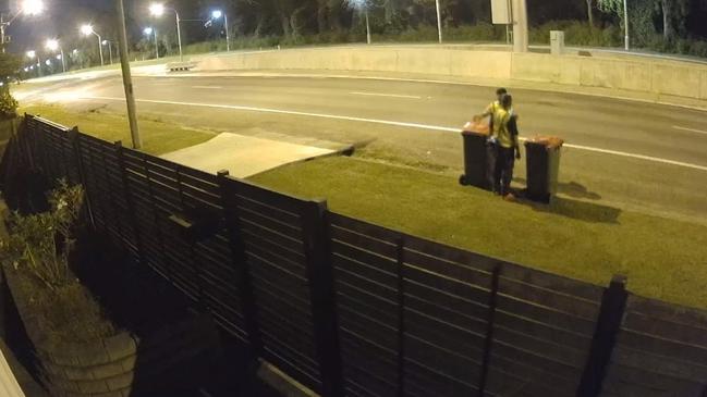 Townsville City Coucil workers checking recycling bins down Riverway Dr at 8pm as part of its bin health check program. Picture: Facebook/Cory Brooks