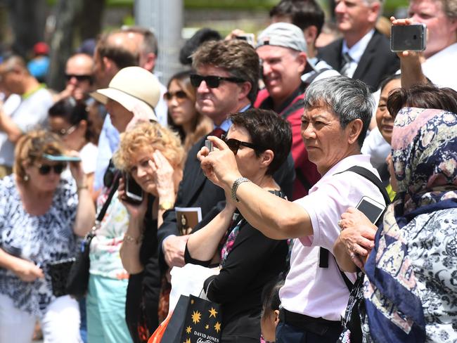 Fans gathered outside the private service. Picture: AAP