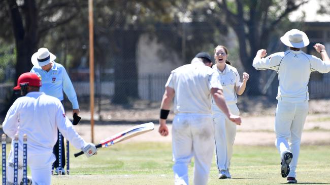 Amanda Jade Wellington taking a wicket for Port Adelaide’s D-grade men in February. Picture: AAP/Keryn Stevens