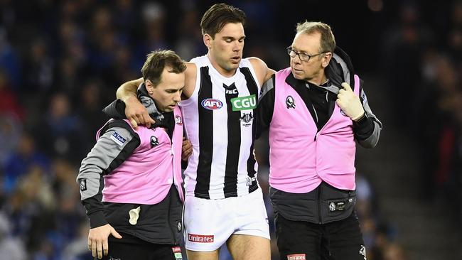 Levi Greenwood hurt his knee after a collision with Todd Goldstein. Picture: Getty