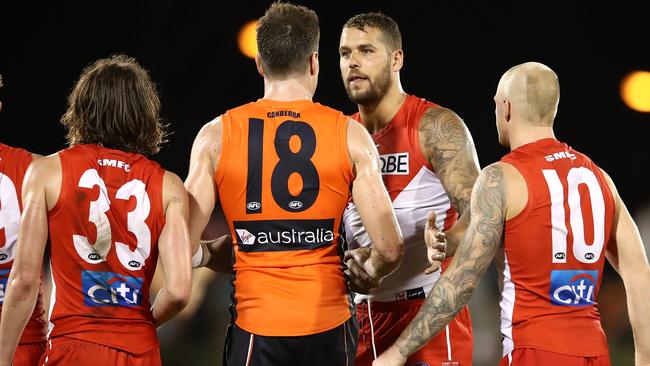 Lance Franklin chats with Jeremy Cameron during the JLT Series. Picture: Getty Images