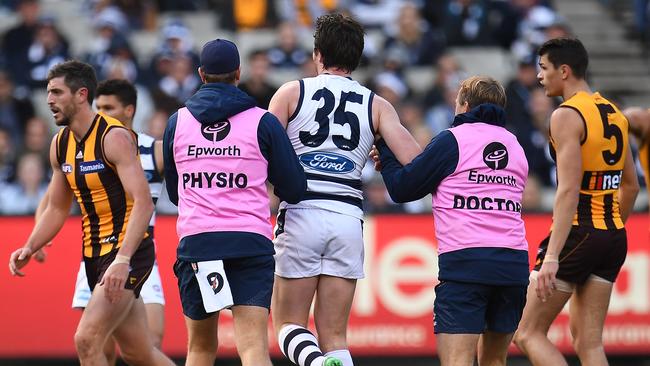 Patrick Dangerfield in the hands of trainers. Photo: AP Image/Julian Smith
