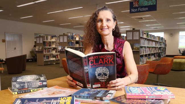 Cairns Regional Council's library services co-ordinator Marina Speziale says that Cairns readers love borrowing adult and children's books, periodicals and DVDs which allow them to escape from challenging times from the city's eight branches. Picture: Brendan Radke