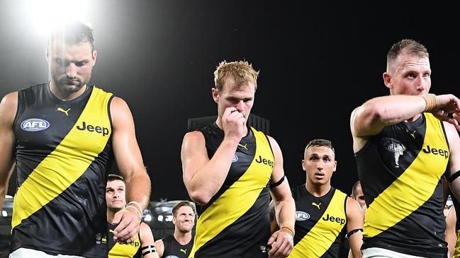 BRISBANE, AUSTRALIA - OCTOBER 02: The Tigers walk off after they were defeated by the Lions during the AFL Second Qualifying Final match between the Brisbane Lions and the Richmond Tigers at The Gabba on October 02, 2020 in Brisbane, Australia. (Photo by Quinn Rooney/Getty Images)