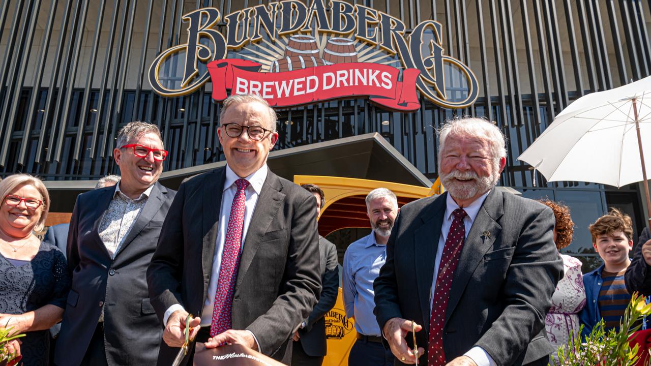 Prime Minister Anthony Albanese cuts the ribbon to open the new Thabeban super brewery with Cliff Fleming.