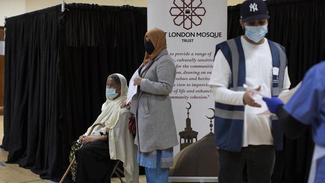 Members of the public receive the AstraZeneca jab at East London Mosque on Wednesday in London, England. Picture: Getty Images