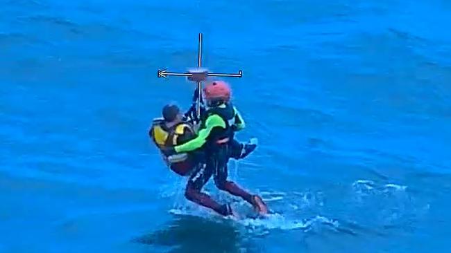 The moment the sailor was plucked from the ocean.