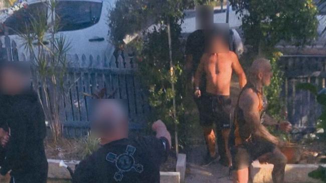 The moment Gympie dad Danny Hawkins was stabbed during a confrontation with a group of men at his Parsons Rd property was captured in pictures and video tendered to Gympie Magistrates Court as part of one of the accused's earlier rejected bail application. The man in the black shirt with his back to the camera is a witness to the alleged incident.