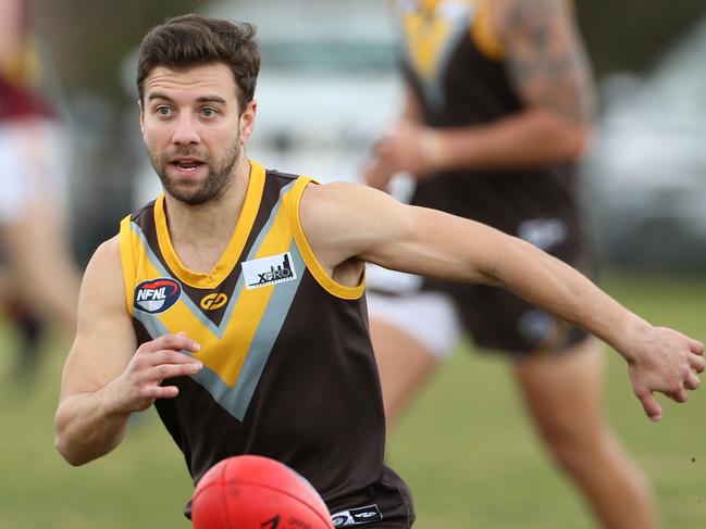 Thomastown’s Salvatore Mamone tracks the footy.