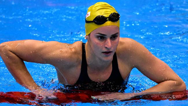 Kaylee McKeown reacts after being disqualified. (Photo by Yuichi YAMAZAKI / AFP)