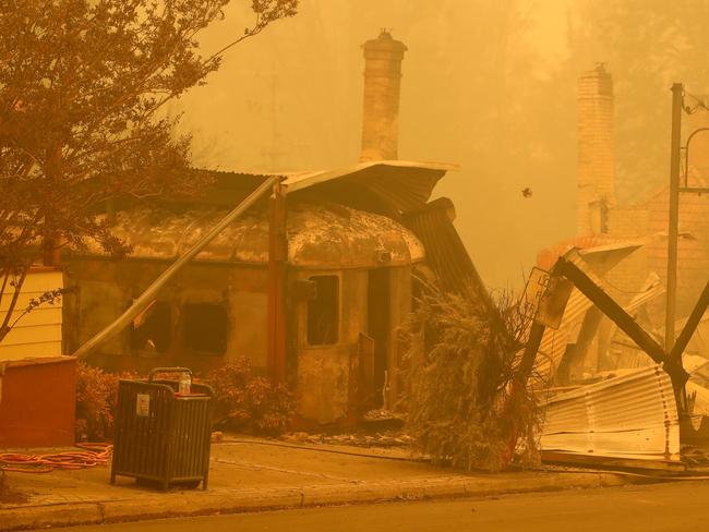 01/01/2020: The main street of Cobargo after a firestorm swept through the area. Bushfires cut off the entire South Coast of NSW on New Years Eve. Stuart McEvoy/The Australian.