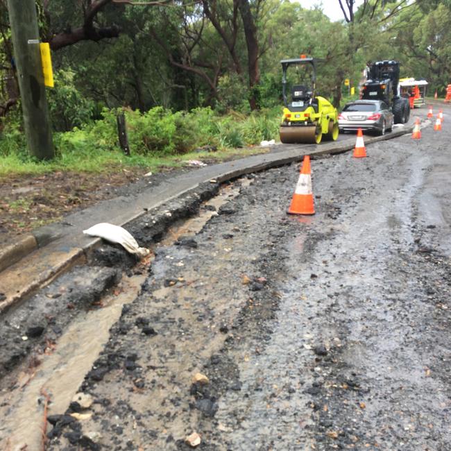 Damage and debris in Plateau Rd, Avalon on Sunday, caused by a heavy downpour on a strip of the street undergoing roadworks. Picture: Supplied