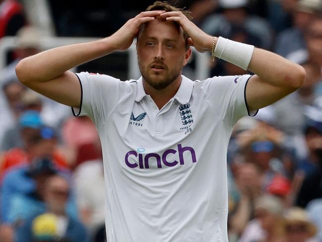 England's Ollie Robinson reacts on day one of the second Ashes cricket Test match between England and Australia at Lord's cricket ground in London, on June 28, 2023. (Photo by Ian Kington / AFP) / RESTRICTED TO EDITORIAL USE. NO ASSOCIATION WITH DIRECT COMPETITOR OF SPONSOR, PARTNER, OR SUPPLIER OF THE ECB