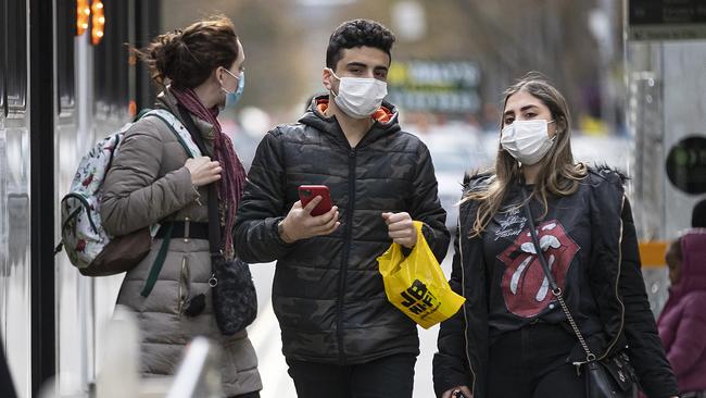 The masks are back in Melbourne as the city faces a seven-day lockdown. Picture: Getty Images