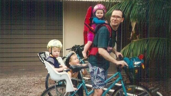 Dr Andrew Bryant with his children when they were young. From left, Alex, John and Charlotte. Picture: Supplied