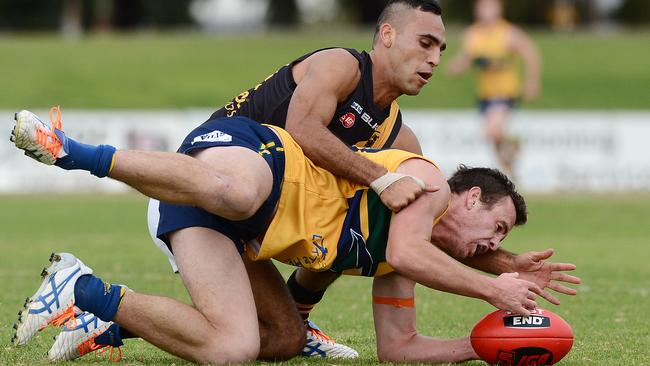 9/5/15 Eagles v Glenelg SANFL Game. Thomas Whittlesea (Eagles) and Aisea Raikiwasa (Glenelg). Picture Roger Wyman