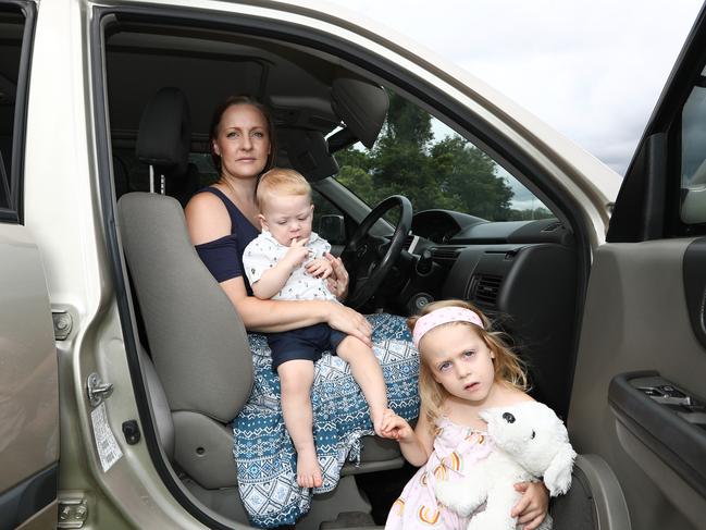 Natalie Friswell, with her kids Kaylee and Hunter, was offered only $950 for her Audi A4 Quattro. Picture: Jason O'Brien