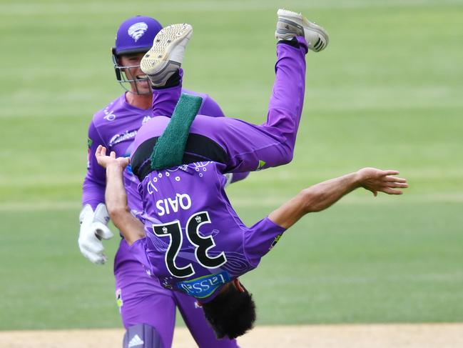 Ahmad throws in a front flip as he celebrates Curran’s wicket. Picture: AAP