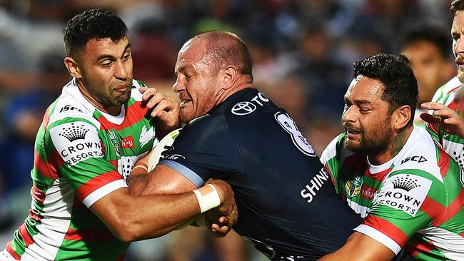 Matt Scott on the charge for the Cowboys against the Rabbitohs. Picture: Zak Simmonds