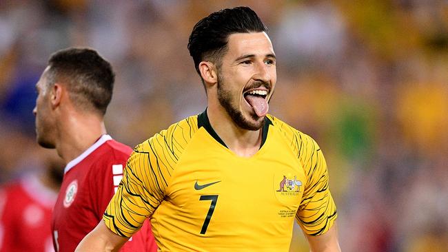 Mathew Leckie of the Socceroos celebrates after scoring a goal during the International friendly match between Australia and Lebanon at ANZ Stadium in Sydney, Tuesday, November 20, 2018. (AAP Image/Dan Himbrechts) NO ARCHIVING, EDITORIAL USE ONLY