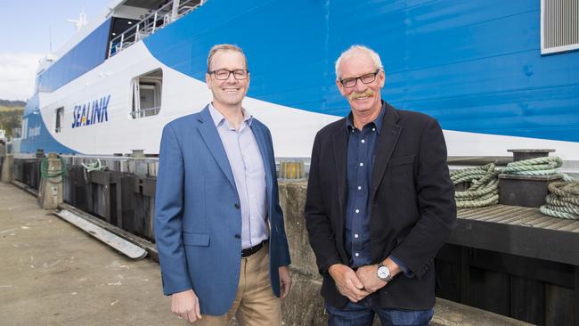 Transport Minister Michael Ferguson and boat builder Toby Richardson at the ferry terminal. Picture: RICHARD JUPE