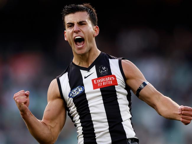 MELBOURNE, AUSTRALIA - AUG 17: Nick Daicos of the Magpies celebrates a goal during the 2024 AFL Round 23 match between the Collingwood Magpies and the Brisbane Lions at The Melbourne Cricket Ground on August 17, 2024 in Melbourne, Australia. (Photo by Michael Willson/AFL Photos via Getty Images)