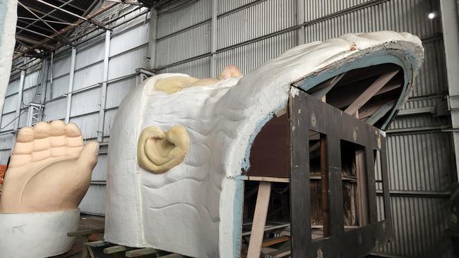 Giant Santa in his former storage facility at Kilburn. Picture: Colin James