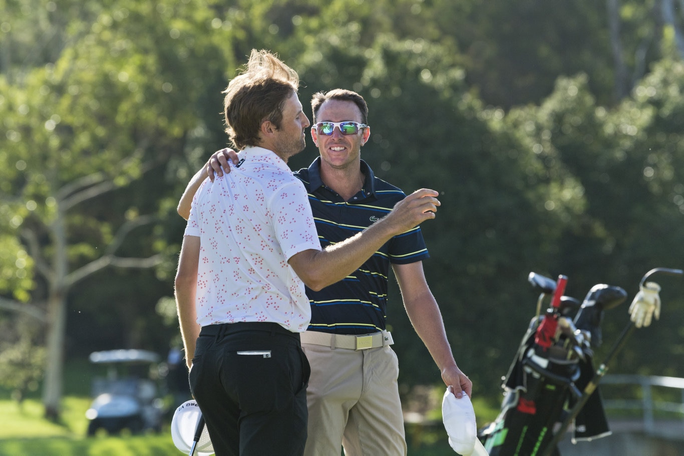 Scott Arnold (facing) congratulates friend Michael Sim after a four-hole playoff for the 2020 Queensland PGA Championship at City Golf Club, Sunday, February 16, 2020. Picture: Kevin Farmer